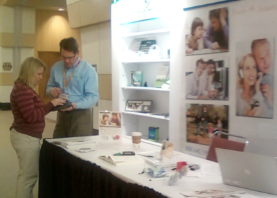 EnableMart AT specialist showing the Orbitouch Keyless Keyboard at UAAACT