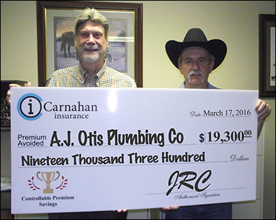 H.J. "Jim" Otis (right) received award from Jerry Carnahan (left)