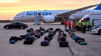 Afghan refugees’ luggage sits at the Torrejon de Ardoz air base in Madrid, Spain, Aug. 24, 2021. By Jesus Hellin/Europa Press...