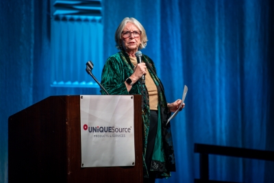 Jan providing the laughs and guidance as she emcees an event in 2025