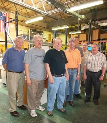 TeamChildren’s fathers, volunteers Bill Whitley, Stan Brooks, Curt Michener, Paul Glass, Dave Mosbruger, Tom Harmaty and preside