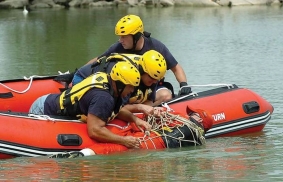 Rescue victim into inflatable boat