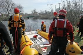 First Responders prepare to launch boat for rescue
