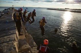 Water Rescue students practice a jetty jump entry into the ocean