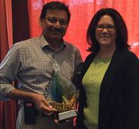 Lisa Anderson presented the LMA Advocate Award to Kash Gokli, a professor at Harvey Mudd College