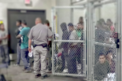 Migrants in a Detention Facility