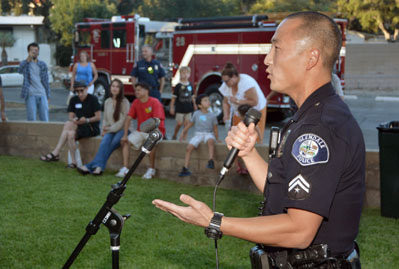 Police Officer Speaking at a Community Meeting