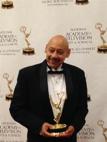 Nate Thomas with his Emmy